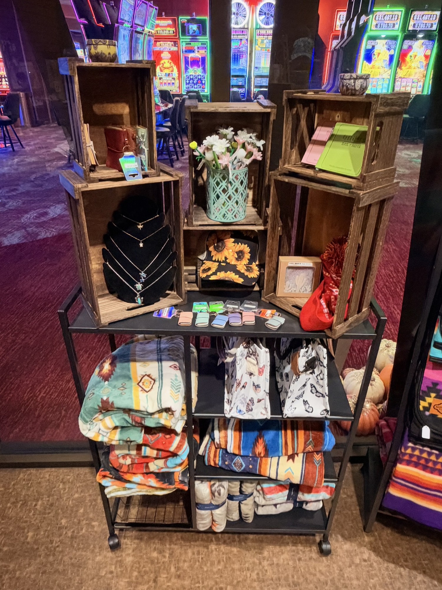 Gift Shop merchandise display with jewelry, blankets and accessories