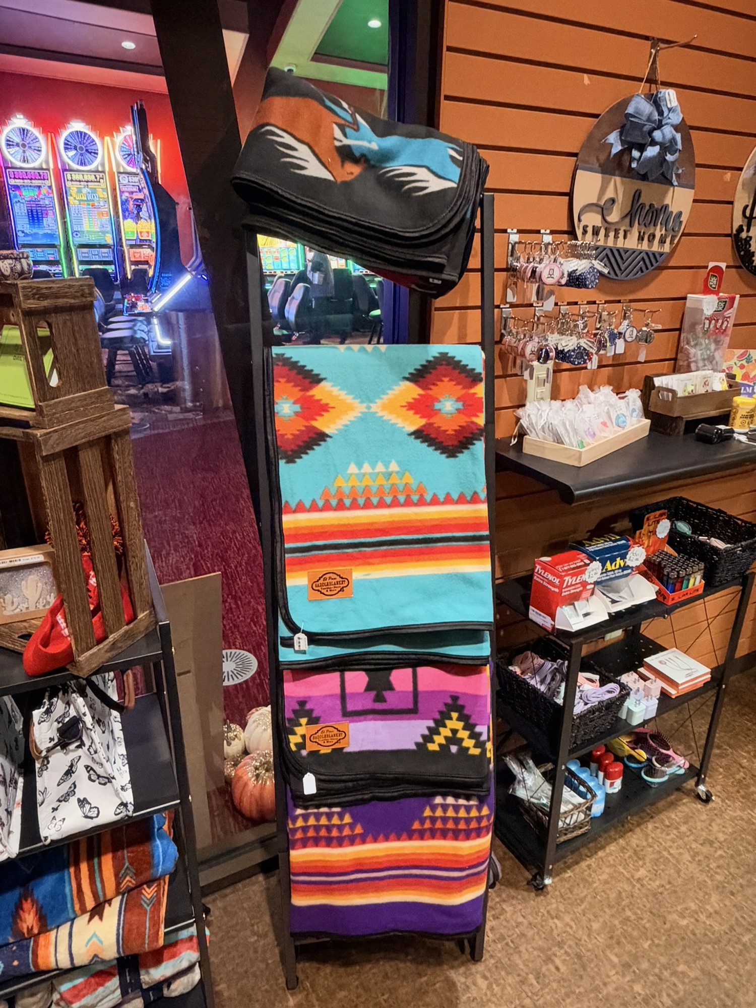 Gift Shop display featuring colorful blankets and accessories