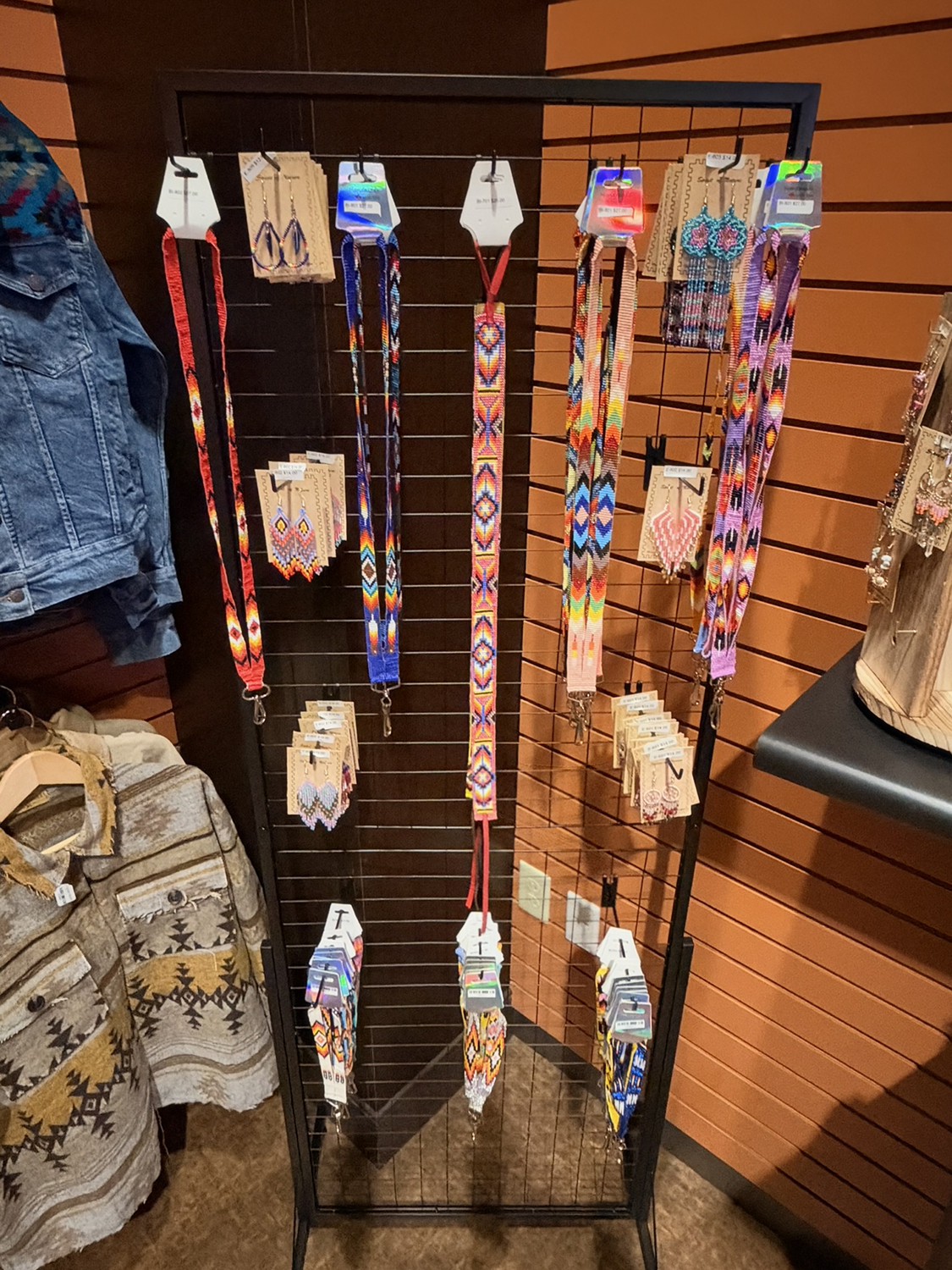 Gift Shop wall display featuring jewelry and handbags